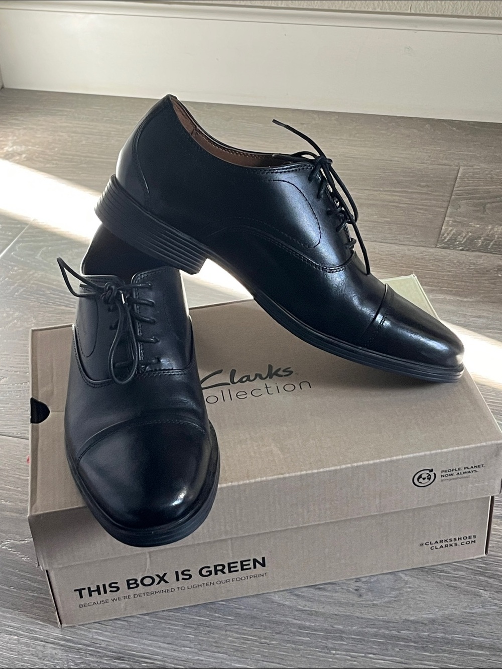 Clarks Men’s Black Leather Cap-Toe Oxfords